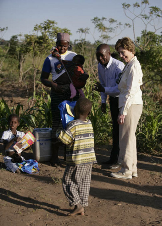Mrs. Laura Bush visits a malaria spraying site Wednesday, June 27, 2007, in Mozal, Mozambique. Each year more than one million people die of malaria. Of these deaths, 85 percent occur in sub-Saharan Africa. For children in Africa, malaria is the leading cause of death. White House photo by Shealah Craighead