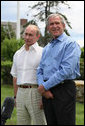President George W. Bush stands with President Vladimir Putin, prior to the Russian leader's departure Monday, July 2, 2007, from Kennebunkport, Me. Said President Bush, "When Russia and the United States speak along the same lines, it tends to have an effect and therefore I appreciate the Russians' attitude in the United Nations. We're close on recognizing that we got to work together to send a common message." White House photo by Eric Draper