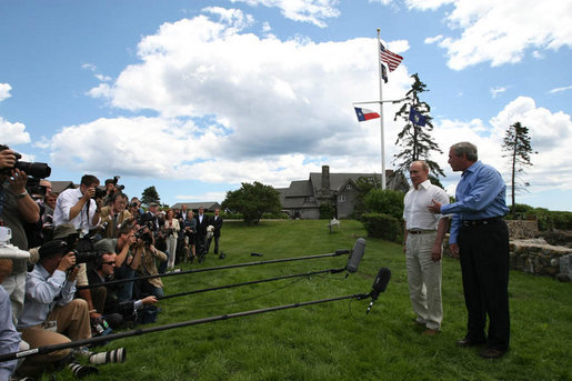 President George W. Bush talks to the members of the media during a press availability with Russia's President Vladimir Putin after their meeting Monday, July 2, 2007, in Kennebunkport, ME. White House photo by Eric Draper