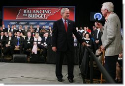 President George W. Bush listens to a question from the audience at the Gaylord Opryland Resort and Convention Center Thursday, July 19, 2007 in Nashville, Tenn., where President Bush addressed economic and budget issues. White House photo by Chris Greenberg