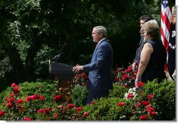 Standing with veterans and military family members, President George W. Bush delivers remarks on the Global War on Terror Friday, July 20, 2007, in the Rose Garden. "When Congress returns after Labor Day, there will be less than one month before the fiscal year ends and current funds for Defense Department operations run out," said the President. "Congress still has an opportunity to do right by our men and women in uniform -- and our national security. So today I call on Congress to take action and get this vital piece of legislation to me to sign -- on budget and on time." White House photo by Joyce N. Boghosian