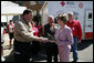 Mrs. Laura Bush meets Jay Reeves, Red Cross worker and first responder to the I-35W bridge collapse in Minneapolis, Friday, Aug. 3, 2007. In an act of courage, Mr. Reeves sprang into action and helped pull children from a stranded school bus on the bridge. White House photo by Chris Greenberg
