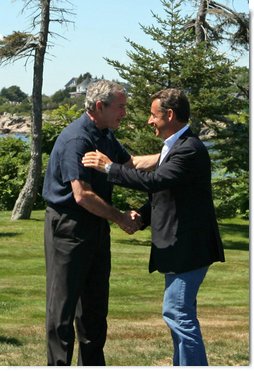 President George W. Bush greets President Nicolas Sarkozy of France upon his arrival to Walker’s Point Saturday, August 11, 2007, in Kennebunkport, Maine. White House photo by Shealah Craighead