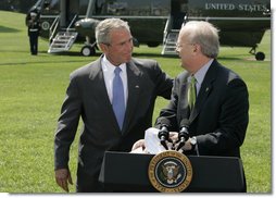 President George W. Bush puts his hand on the shoulder of Karl Rove Monday, August 13, 2007, after the longtime Deputy Chief of Staff and Senior Advisor announced his resignation during a statement on the South Lawn. In thanking Mr. Rove for his service and friendship, the President said, ". I thank my friend. I'll be on the road behind you here in a little bit." White House photo by Joyce N. Boghosian