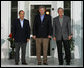 President George W. Bush stands with Mexican President Felipe Calderon, left, and Canadian Prime Minister Stephen Harper upon their arrival for dinner Monday, Aug. 20, 2007, during the North American Leaders' Summit at the Fairmont Le Chateau Montebello in Montebello, Canada. White House photo by Chris Greenberg