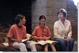 Mrs. Laura Bush talks with two girls participating in the park's Junior Ranger program at Grand Teton National Park Aug. 27, 2007, in Moose, Wyo. "Here in Wyoming, the parks introduce young people both to the natural world, and to their history, the history of their own state," said Mrs. Bush during her remarks. White House photo by Shealah Craighead