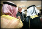 President George W. Bush greets local leaders of Al Anbar Province before their meeting at Al Asad Airbase, Al Anbar Province, Iraq, Monday, September 3, 2007. White House photo by Eric Draper
