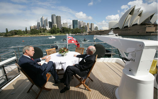 President George W. Bush and Prime Minister John Howard of Australia, sit topside aboard the Age Quod Agis during a tour of Sydney Harbour Wednesday, Sept. 5, 2007. White House photo by Eric Draper