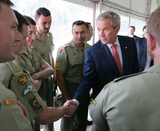 President George W. Bush talks with a member of the Australian Defense Force during a luncheon at the Royal Australia Navy Heritage Centre Wednesday, Sept. 5, 2007, on Garden Island in Sydney Harbour. White House photo by Eric Draper