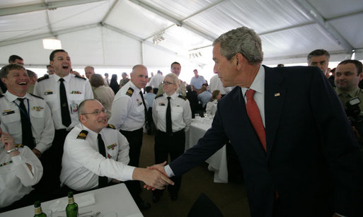 President George W. Bush greets Australian troops during a social lunch Wednesday, Sept. 5, 2007, on Garden Island in Sydney. White House photo by Eric Draper
