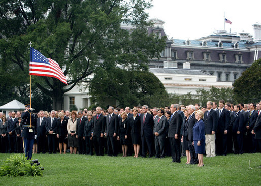President George W. Bush and Mrs. Laura Bush are joined by Vice President Dick Cheney and Mrs. Lynne Cheney Tuesday, Sept. 11, 2007, on the South Lawn of the White House for a moment of silence in memory of those who died Sept. 11, 2001. White House photo by David Bohrer