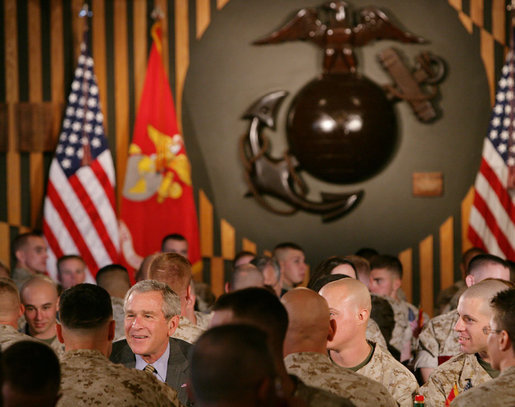 President George W. Bush talks with U.S. Marines during his lunch visit to The Basic School at Quantico Marine Corps Base Friday, Sept.14, 2007 in Quantico, Va. White House photo by Chris Greenberg
