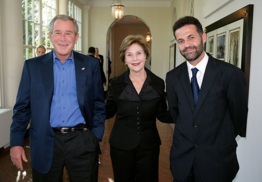 President George W. Bush and Mrs. Laura Bush welcome author Khaled Hosseini to the White House for a screening Sunday, Sept. 16, 2007, of the film adaptation of Hosseini's novel, "The Kite Runner," a fictional story of the friendship between Amir, a privileged boy, and Hassan, the son of his father's servant, in Afghanistan during the last days of the monarchy through the rule of the Taliban. Guests at the screening included: Vice President Dick Cheney; Secretary of Defense Robert Gates; Chairman of the Joint Chiefs of Staff General Peter Pace; National Security Advisor Stephen Hadley; Ambassador Said T. Jawad of Afghanistan; former U.S. Ambassador to Afghanistan, now U.S. Ambassador to the United Nations Zalmay Khalilzad; former U.S. Ambassador to Afghanistan Ronald E. Neumann; and President of the American University in Afghanistan Tom Stauffer. White House photo by David Bohrer