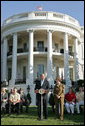 Standing with Mrs. Laura Bush, President George W. Bush addresses military support organizations Tuesday, Sept. 18, 2007, on the South Lawn. “I feel a very strong obligation, since it was my decision that committed young men and women into combat, to make sure our veterans who are coming back from Iraq and Afghanistan get all the help this government can possibly provide,” said President Bush. White House photo by Chris Greenberg