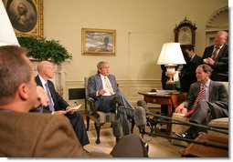 President George W. Bush discussed the economy with the press Friday, Oct. 5, 2007, in the Oval Office. Pictured with the President are, from left: OMB Director Jim Nussle, CEA Chairman Ed Lazear and NEC Director Al Hubbard. "I want to thank members of my economic team for coming in the Oval Office this morning to bring some good news here for America's families and America's working people. The -- last month our economy added 110,000 new jobs," said President Bush. "And that's good news for people here in our country. It's an indicator that this economy is a vibrant and strong economy." White House photo by Eric Draper