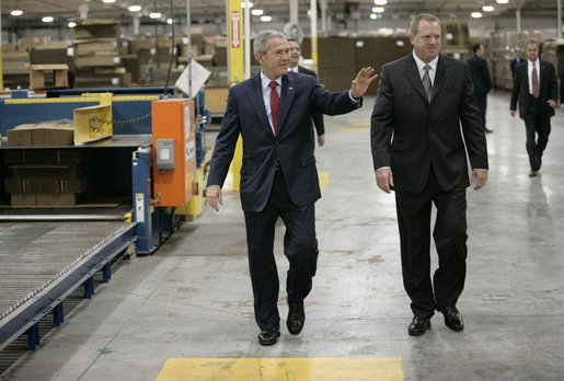 President George W. Bush tours the Stribling Packaging Inc., Monday, Oct. 15, 2007 in Rogers, Ark., with company President Bill Stribling. The facility specializes in the design of corrugated boxes and point-of-purchase displays. President Bush later met for lunch with local business leaders and delivered an address on fiscal responsibility. White House photo by Eric Draper