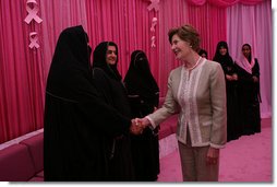 Mrs. Laura Bush meets one-on-one with women in the Pink Majlis Monday, Oct. 22, 2007, at the Sheikh Khalifa Medical Center in Abu Dhabi, United Arab Emirates. The Majlis is a tradition of open forum for a wide range of topics. The Majlis focuses on issues related to breast cancer. White House photo by Shealah Craighead