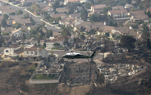 President George W. Bush, aboard Marine One, receives an aerial tour of fire-ravaged Southern California Thursday, Oct. 25, 2007. At least three people have died since the fires began and thousands have been evacuated from their homes. White House photo by Eric Draper