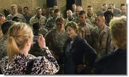 Mrs. Laura Bush poses for pictures after addressing American troops Thursday, Oct. 25, 2007, at Ali Al Salem Air Base, Kuwait. It is the third country visited by the First Lady on her four-country, Mideast tour. White House photo by Shealah Craighead