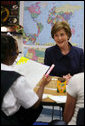 Mrs. Laura Bush visits with students at the Good Shepherd Nativity Mission School, Thursday, Nov. 1, 2007 in New Orleans, a Helping America's Youth visit with Big Brother and Big Sisters of Southeast Louisiana. Mrs. Bush thanked the group saying,"We know that positive role models are essential to young people's success." White House photo by Shealah Craighead