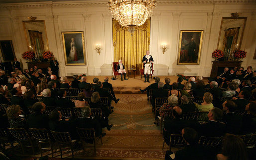 General George Washington (played by Dean Malissa) and General Marie Joseph Paul Yves Roch Gilbert du Motier, the Marquis de LaFayette (played by Benjamin Goldman), entertain the guests Tuesday, Nov. 6, 2007, in the East Room following a dinner in honor of President Nicolas Sarkozy at the White House. White House photo by Chris Greenberg