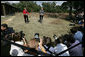 President George W. Bush and German Chancellor Angela Merkel stand before the press following their meeting at the Bush Ranch in Crawford, Texas, Saturday, Nov. 10, 2007. White House photo by Eric Draper