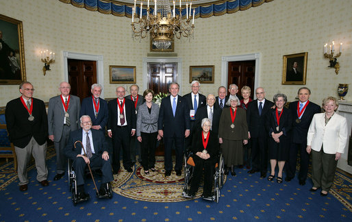 President George W. Bush and Laura Bush stand with the recipients of the 2007 National Humanities Medal Thursday, Nov. 15, 2007, in the East Room. White House photo by Chris Greenberg