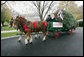 Scott D. Harmon of Brandy Station, Va., drives a horse-drawn carriage delivering the official White House Christmas tree Monday, Nov. 26, 2007, to the North Portico of the White House. The 18-foot Fraser Fir tree, from the Mistletoe Meadows tree farm in Laurel Springs, N.C., will be on display in the Blue Room of the White House for the 2007 Christmas season. White House photo by Chris Greenberg