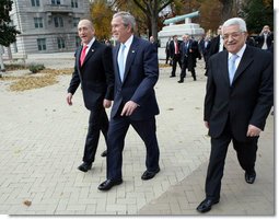 President George W. Bush, Prime Minister Ehud Olmert, left, of Israel, and President Mahmoud Abbas of the Palestinian Authority walk to Bancroft Hall on the grounds of the U.S. Naval Academy in Annapolis, Maryland, during the Annapolis Conference Tuesday, Nov. 27, 2007.  White House photo by Chris Greenberg