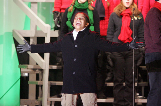 Seventh-grader Julian Ivey, who just completed a 6-month run on Broadway as Simba in "The Lion King," performs onstage Thursday, Dec. 6, 2007, at the Ellipse during the lighting of the National Christmas Tree. White House photo by Joyce N. Boghosian
