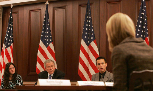 President George W. Bush participates in a meeting Tuesday, Dec. 11, 2007, on the Monitoring the Future Study on teen drug use. The study tracks drug use among America's young people and according to the latest study, there are more than 800,000 fewer young people using illicit drugs today than there were in 2001. With the President are Sara Johnson, left, 16, from Michigan, and Justin Calderon, 19, from California, both recovering addicts. White House photo by Chris Greenberg