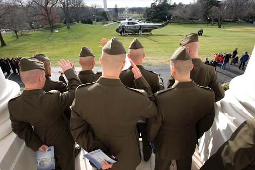 Marines from Quantico Marine Base Delta Company 1st Platoon look on as President George W. Bush boards Marine One before departing the White House for his trip to Fredericksburg, Virginia, Monday, Dec. 17, 2007. White House photo by Eric Draper