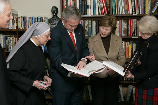 President George W. Bush and Mrs. Laura Bush visit the "book nook" at the Little Sisters of the Poor Tuesday, Dec. 18, 2007, in Washington, D.C. With them are, from left: Archbishop Donald Wuerl of the Archdiocese of Washington, Mother Benedict de la Passion, Superior and President of Little Sisters of the Poor, and Mary Ann Lucey, volunteer librarian. White House photo by Chris Greenberg