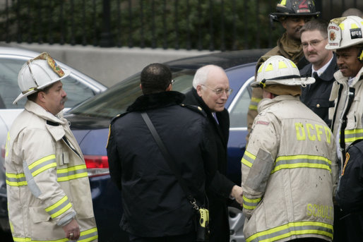 Vice President Dick Cheney shakes hands with Washington, D.C. firefighters as he and President George W. Bush thanked the men for their efforts Wednesday, Dec. 19, 2007, in battling a morning blaze in the Eisenhower Executive Office Building. White House photo by Shealah Craighead