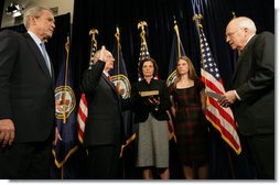 President George W. Bush stands next to Lt. Gen. James Peake (Ret.), as he's administered the Oath of Office Thursday, Dec. 20, 2007, as Secretary of Veterans Affairs by Vice President Dick Cheney. Looking on during the ceremonial swearing-in at the U.S. Department of Veterans Affairs are Secretary Peake's wife, Janice, and daughter, Kimberly. White House photo by Chris Greenberg