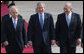President George W. Bush and Israel’s Prime Minister Ehud Olmert smile as they join Israeli President Shimon Peres for arrival ceremonies Wednesday, Jan. 9, 2008, after President Bush’s arrival in Tel Aviv. White House photo by Chris Greenberg