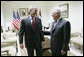 President George W. Bush and President Mahmoud Abbas of the Palestinian Authority share a moment before their joint press availability Thursday, Jan. 10, 2008, in Ramallah. White House photo by Eric Draper.