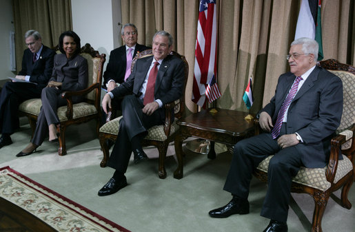 President George W. Bush and President Mahmoud Abbas of the Palestinian Authority, pause for photographs before the start of their expanded meeting Thursday, Jan. 10, 2008, at the President’s Ramallah residence. With them are, from left: U.S. National Security Adviser Stephen Hadley, Secretary of State Condoleezza Rice, and Gamal Helal, White House Interpreter. White House photo by Chris Greenberg