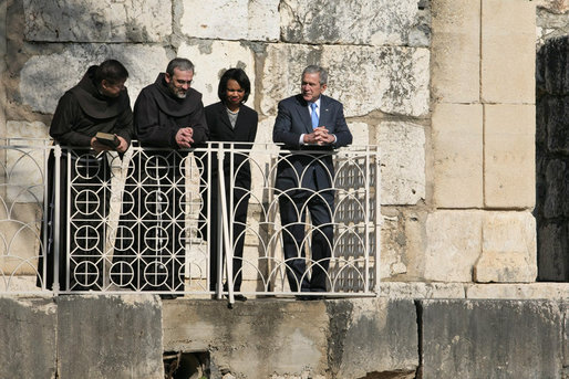 President George W. Bush and Secretary of State Condoleezza Rice stand amidst the ruins of Capernaum, on the shore of the Sea of Galilee, during his final stop Friday, Jan. 11, 2008, in Israel. White House photo by Eric Draper