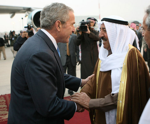 President George W. Bush is greeted by Amir Shaykh Sabah Al-Ahmed Al-Jaber Al Sabah after arriving Friday, Jan. 11, 2008, at Kuwait International Airport in Kuwait City. White House photo by Eric Draper