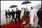 President George W. Bush and President Sheikh Khalifa bin Zayed Al Nayhan of the United Arab Emirates, walk the red carpet after the arrival Sunday, Jan. 13, 2008, of President Bush at Abu Dhabi International Airport. White House photo by Eric Draper