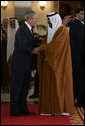 President George W. Bush shakes hands with Sheikh Khalifa bin Zayed Al Nahyan, President of the United Arab Emirates, Sunday, Jan. 13, 2008, following arrival ceremonies at Al Mushref Palace in Abu Dhabi. White House photo by Chris Greenberg