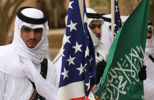 A Saudi honor guard stands with the U.S. and Saudi flags Tuesday, Jan. 15, 2008, awaiting the arrival of President George W. Bush to Al Murabba Palace in Riyadh. White House photo by Chris Greenberg