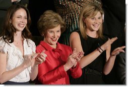Mrs. Laura Bush and her daughters, Barbara, left, and Jenna applaud from the First Lady's box at the U.S. Capitol, as President George W. Bush delivers his State of the Union Address Monday, Jan. 28, 2008. White House photo by Shealah Craighead