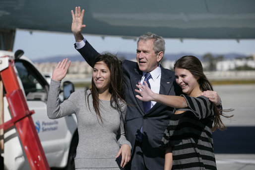President George W. Bush waves to the friends and family of sisters Marni and Berni Barta of Los Angeles, Calif., after presenting them with the President’s Volunteer Service Award, Wednesday, Jan. 30, 2008 in Los Angeles, for their founding of the not-for-profit program Kid Flicks. The Kid Flicks program collects and donates new and used DVDs to children’s hospitals and pediatric centers across the U.S. White House photo by Eric Draper