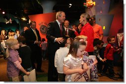 President George W. Bush is greeted upon arrival at Hallmark Cards, Inc., in Kansas City, Mo., Friday, Feb. 1, 2008, where he delivered a statement on the economy. White House photo by Eric Draper