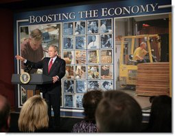 President George W. Bush delivers a statement on the economy during his stop Friday, Feb. 1, 2008, at Hallmark Cards, Inc. in Kansas City, Mo. The President told his audience, "I've got an agenda for Congress. I'm looking forward to working with them on how to stimulate the economy in the short-term, but make sure we remain a strong economy in the long-term. And I'm looking forward to working with them." White House photo by Eric Draper