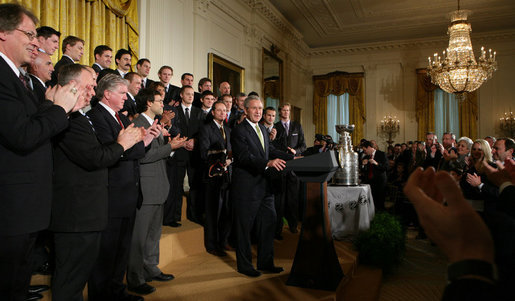 President George W. Bush welcomes the 2007 NHL Stanley Cup champion Anaheim Ducks to the East Room of the White House Wednesday, Feb. 6, 2008. The Ducks claimed their first Cup when they defeated the Ottawa Senators in the best-of-seven championship series in June 2007. White House photo by Chris Greenberg