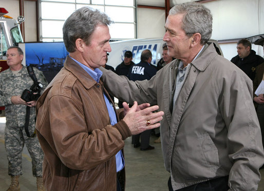 President George W. Bush spends a moment with Shelvy Linville, Mayor of Macon County, Tennessee, after attending a briefing Friday, Feb. 8, 2008, on the regional tornado damage left in the wake of Tuesday's deadly storms. White House photo by Chris Greenberg