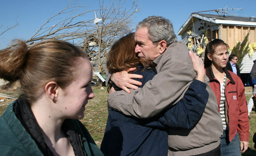 President George W. Bush comforts a resident of Lafayette, Tennessee during his tour Friday, Feb. 8, 2008, of the destruction left in the wake of Tuesday's deadly tornadoes. White House photo by Chris Greenberg